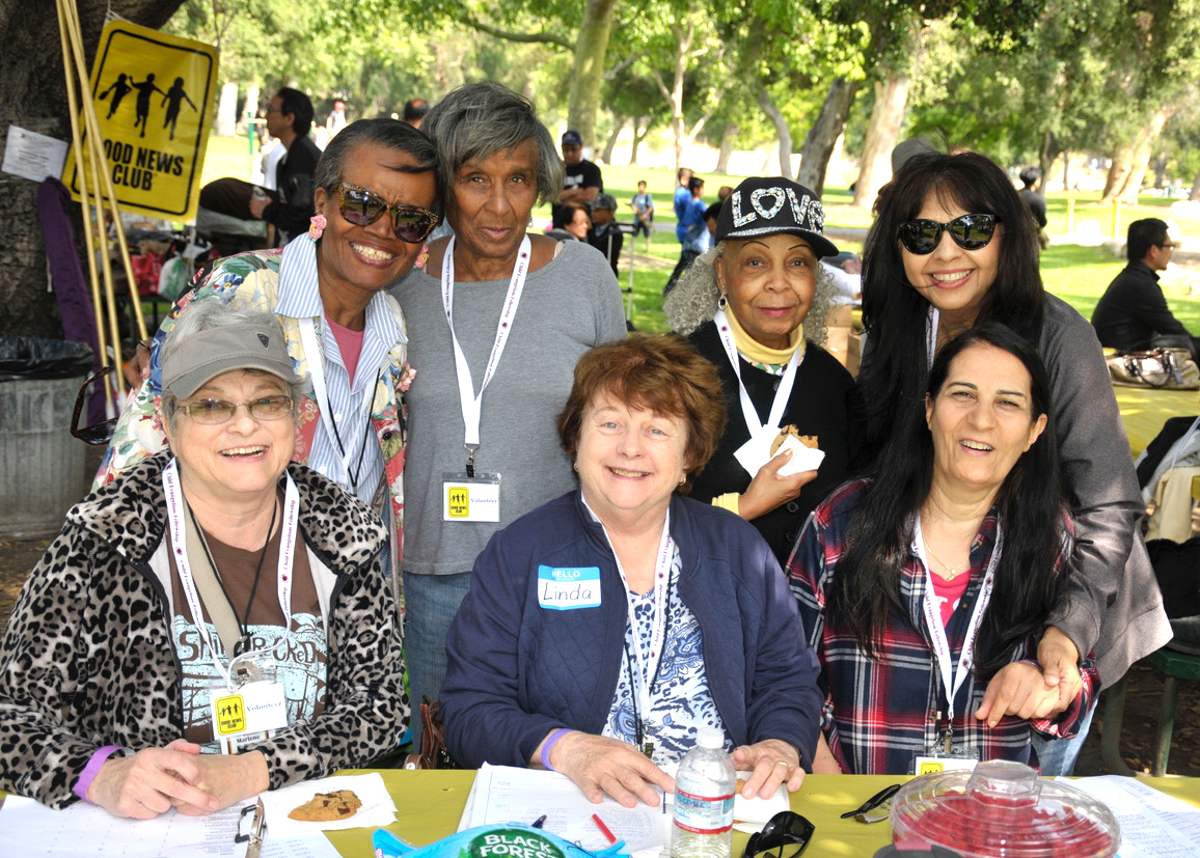 CEF Pasadena volunteers smiling together at an outdoor event