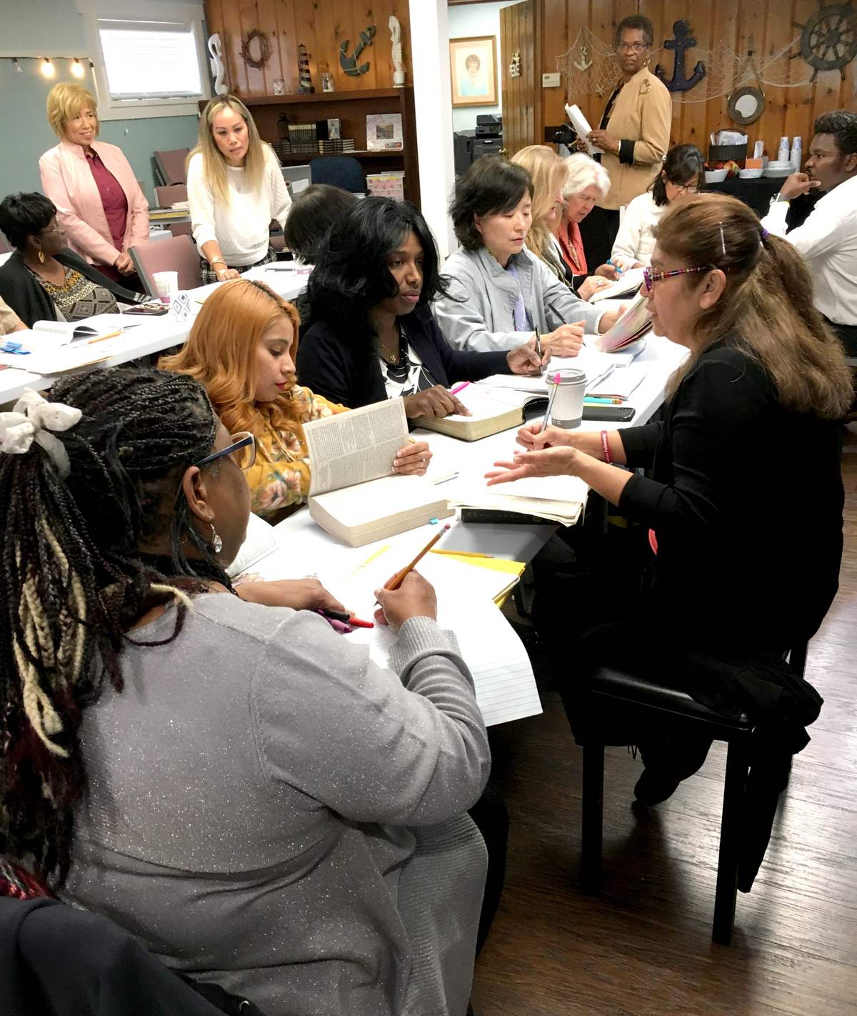 Teachers in training working together around a table